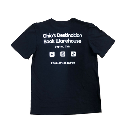 back of black tee with Dollar Book Swap information