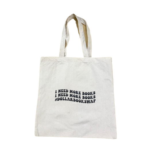 natural canvas tote with text "I Need More Books #DollarBookSwap"